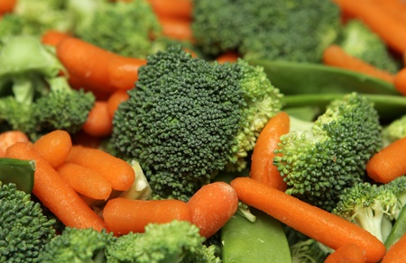 extremely close up fresh salad including broccoli and carrotの写真素材