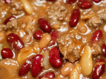 mixed beans extreme closeup cooking in a pan with minced beefの写真素材