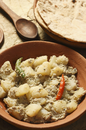 Aloo Posto is a delicious Bengali side dish generally eaten as a dry accompaniment to a meal of rice and curries It is made from fried Potato With Poppy Seeds の写真素材