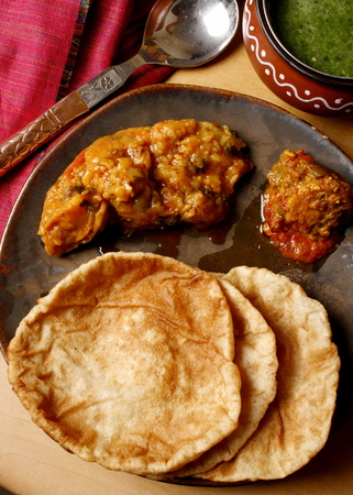 Khasta puri – A crumbly fried bread of refined flour flavoured with carom seeds