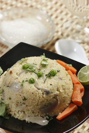 Upma is basically a South Indian breakfast item  It is usually made with refined wheat grains- which Indians generally call suji and southindian as rava の写真素材