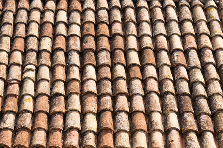 Traditional roof in clay tiles of ancient Italian villagesの写真素材