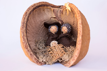 Nativity scene in a coconut shell, made by a craftsman with recycled material.の写真素材