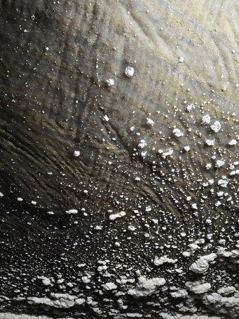 Glossy salt wall with cloud-like white salt deposits in underground Salina Turda salt mine. Cluj, Romaniaの写真素材