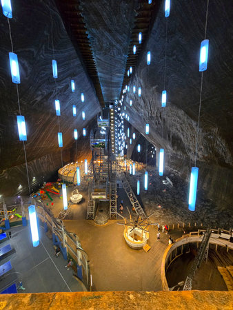 Perspective view of Rudolf Mine in underground Salina Turda salt mine with amusement park inside, wood walkway all around at the top. Cluj, Romaniaの写真素材