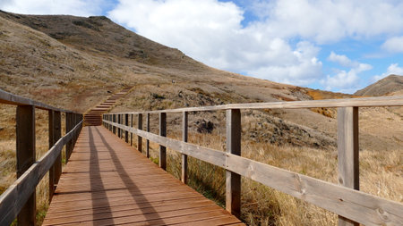 Long wooden jetty on the coast of Madeira, Portugalの写真素材