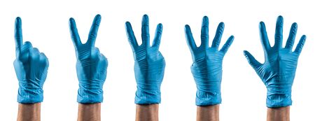 Some hands with blue latex glove counting one to fiveの写真素材