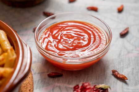 Tomato sauce in a glass bowlの写真素材