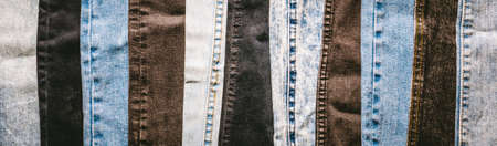 Different shades of denim fabric, black and blue.の写真素材
