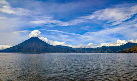 VolcÃ¡n AtitlÃ¡n is a large, conical, active stratovolcano adjacent to the caldera of Lake AtitlÃ¡n in the Guatemalan Highlands of the Sierra Madre de Chiapas range.の写真素材