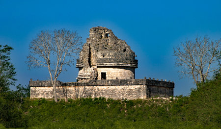 This ancient structure called "El Caracol", was a kind of observatory and is a unique architectural piece at pre-Columbian Maya civilization site of Chichen Itza. El Caracol, which means 'snail' in Spanish, is so named due to the spiral staircase inside the tower.の写真素材