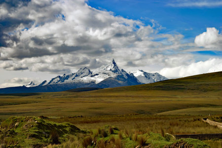 Picture of Snowy mountain peak in the Andes mountains near Huaraz Peru. These places are best for ski and snow tours in Huaraz.の写真素材