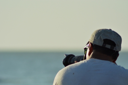 Photographer at the ocean