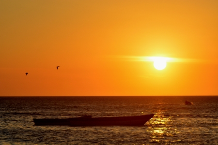 Boat at sunsetの写真素材