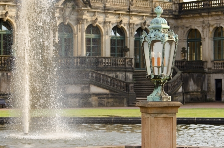 A Lamp next to the Fountain in the Zwinger, a Rococo Palace in the City of Dresdenのeditorial素材