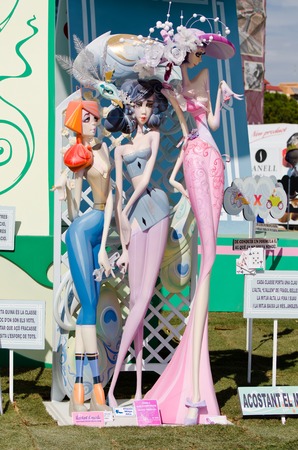 VALENCIA, SPAIN - MARCH 17: A large monument with parodic and humorous figures stands in the street during the Fallas Festival, March 17, 2013 in Valencia, Spain. The Fallas is a traditional celebration in which hundreds of papier mache sculptures are disのeditorial素材