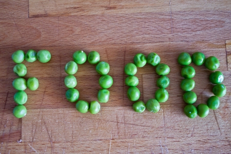 Food word written with fresh peasの写真素材