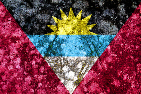 Old antigua barbuda grunge flag painted on a wallの写真素材