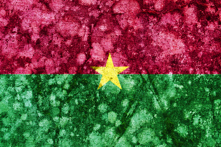 Old burkina faso grunge flag painted on a wallの写真素材