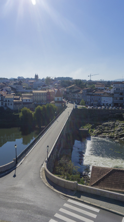 Barcelos historical bridge seen from above on a sunny dayの写真素材