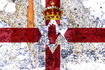 northern ireland national flag with old wall textureの写真素材