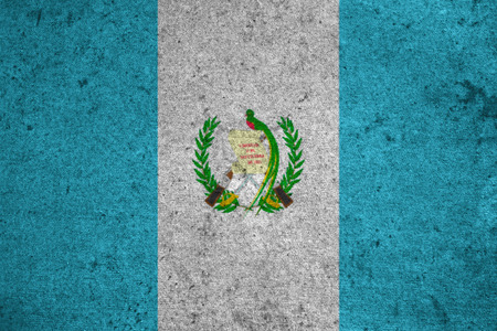 guatemala flag on an old grunge backgroundの写真素材