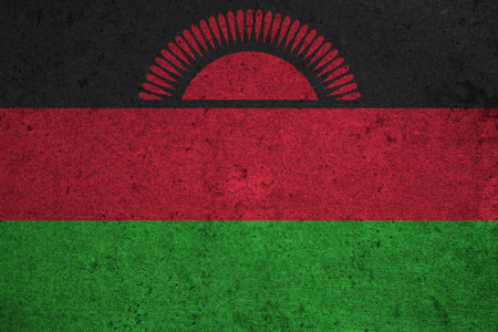 Malawi flag on an old grunge backgroundの写真素材