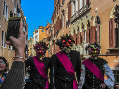 Venice, Italy, February 28, 2019: Venice Carnival Masks, Hats and Costumes