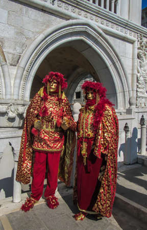 Venice, Italy, February 28, 2019: Venice Carnival Masks, Hats and Costumesのeditorial素材