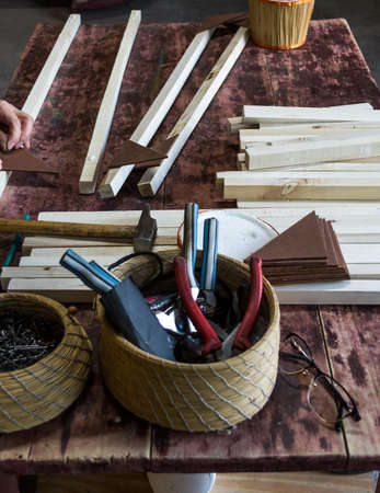 Tools, hammer, wood, mask, press, glue, glue, work table.の写真素材