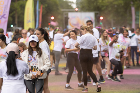 Madrid, Spain, Athletes running in a race with colored powders through the streets of Madrid against violenceのeditorial素材