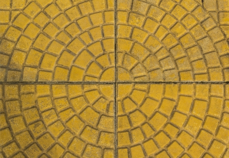Close up circular yellow brick paving patternの写真素材