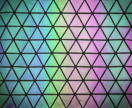 Bright seamless rainbow pattern with iridescent on triangles backgroundの写真素材