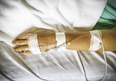 The hand of a patient in hospitalの写真素材