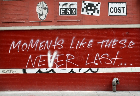 Moments like this never last written on a red brick wall in New Yorkのeditorial素材