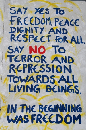 Berlin wall graffiti saying no to terror and saying yes to freedomのeditorial素材