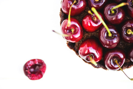 Homemade Raw Vegan Cherry Tart and Several Cherries nearby, macro shot, selective focus, shallow DOFの写真素材