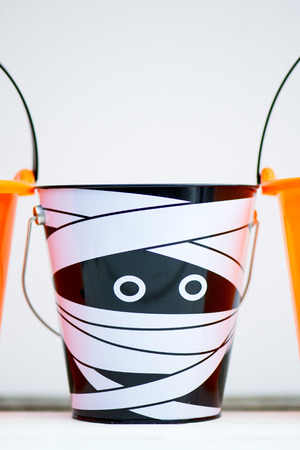 Child Trick or Treat Empty Halloween Buckets are Ready for the Candy Treats, Pumpkin and Mummy Styleの写真素材