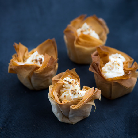Homemade Filo Pastry Baskets with Mascarpone Cream, Dark Background