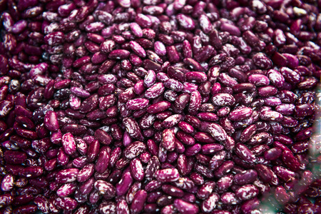Organic Healthy Red Kidney Speckled Beans on a Tray, shallow DOF