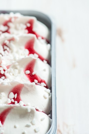 Vanilla Berry Ice Cream in the Container, close up image