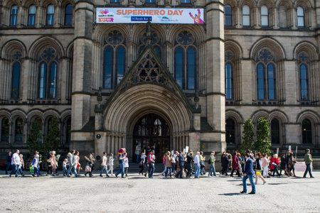 Manchester, UK - May 7, 2017: Procession near Town Hall of people with photos of their relatives in remembrance of Victory Day (the 9th of May), which is called Immortal Regimentのeditorial素材