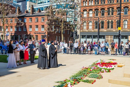Manchester, UK - May 7, 2017: Procession near Town Hall of people with photos of their relatives in remembrance of Victory Day (the 9th of May), which is called Immortal Regimentのeditorial素材