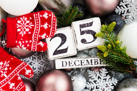 Christmas decorations and wooden blocks with 25 December date in