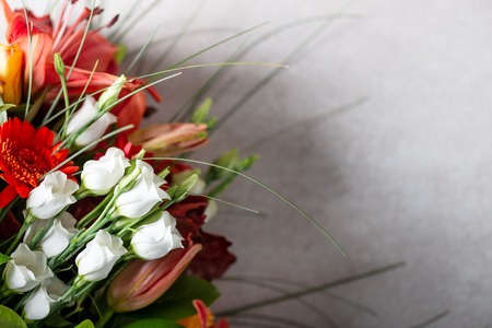 Vibrant Bouquet of orange Asiatic lilies and other flowersの写真素材
