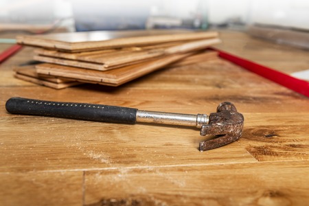 The process of house renovation with changing of the floor from carpets to solid oak wood. Different...