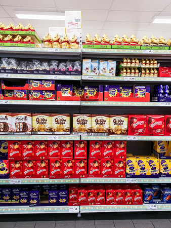 Manchester, UK - Feb 18th, 2019: Selection of different chocolate easter eggs on shelves in a shop store before the Easter holidays.のeditorial素材