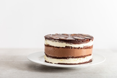 Belgian Chocolate Layered Gateau. Layers of moist choco sponge, vanilla cream and indulgent dark...