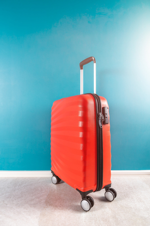 Bright and stylish cabin size suitcase as holiday conceptの写真素材