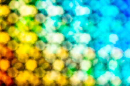 Abstract background, defocused image with bokeh effect of colorful gradient